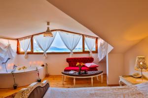 Ένα ή περισσότερα κρεβάτια σε δωμάτιο στο Oyster Residences - Adult Only