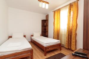 Postel nebo postele na pokoji v ubytování Casa ARBO