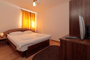 Postel nebo postele na pokoji v ubytování Casa ARBO