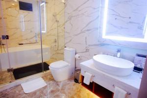 Koupelna v ubytování Bella Vita Hotel