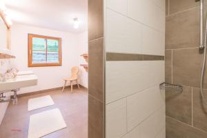 a bathroom with a shower and a sink at Almliesl PIES-533 in Piesendorf