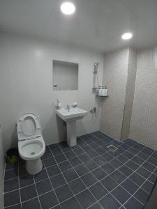 Koupelna v ubytování Bomgoro Guesthouse