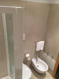 Koupelna v ubytování Hotel Ottagono + 12 fotografií