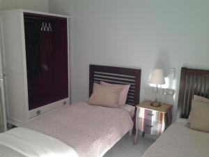 Łóżko lub łóżka w pokoju w obiekcie Pop Art House 2 Bedrooms