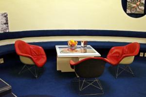 A seating area at Albergo Residence Italia Vintage Hotel