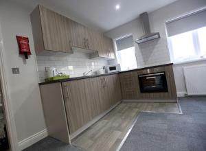 Kuchyň nebo kuchyňský kout v ubytování Hotel 52 Stanley