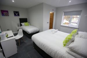 Postel nebo postele na pokoji v ubytování Hotel 52 Stanley