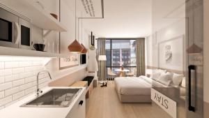 Kuchyň nebo kuchyňský kout v ubytování Great Living Apartments