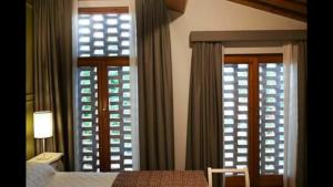 Postel nebo postele na pokoji v ubytování Agriturismo Casanova di Nardini