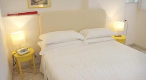 Letto o letti in una camera di Albergo dei Pini