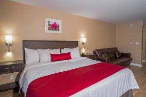 Postel nebo postele na pokoji v ubytování Hotel Bromont