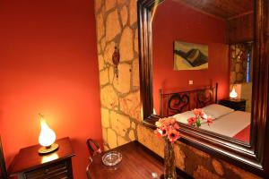 A bed or beds in a room at XENIOS ZEYS (ΞΕΝΙΟΣ ΖΕΥΣ)