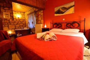 A bed or beds in a room at XENIOS ZEYS (ΞΕΝΙΟΣ ΖΕΥΣ)