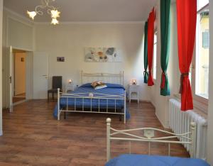 Postel nebo postele na pokoji v ubytování Terra d' Arezzo + 13 fotografií
