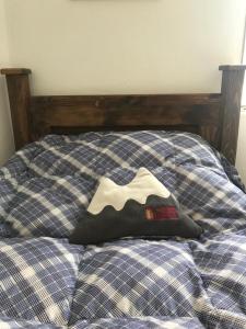 Postel nebo postele na pokoji v ubytování Hostal Casa Lantana