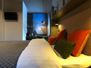 TV a/nebo společenská místnost v ubytování Hotel Les Etagnes