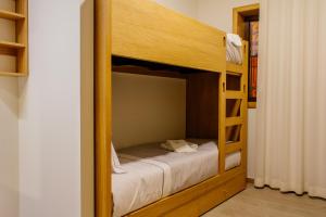 a couple of bunk beds in a room at Venceslau Wine Boutique Hostel in Vila do Conde