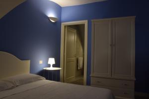 Residenza Cavour客房内的一张或多张床位