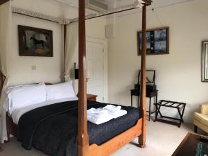 Postel nebo postele na pokoji v ubytování Emlagh House