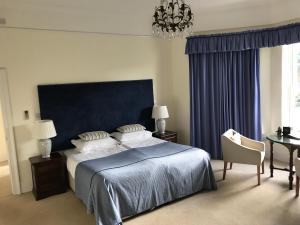 Postel nebo postele na pokoji v ubytování Emlagh House