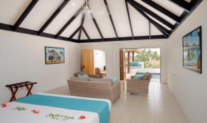 Кровать или кровати в номере Tropica Island Resort-Adults Only