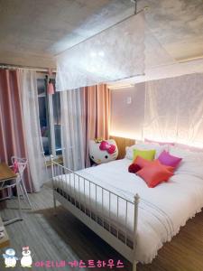 Postel nebo postele na pokoji v ubytování Ariene Guesthouse
