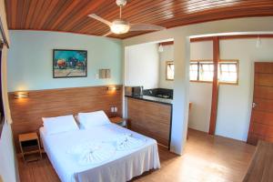 Postel nebo postele na pokoji v ubytování Flat Vila Morena a pousada da sua família