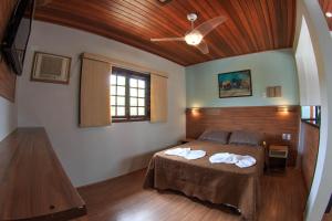 Postel nebo postele na pokoji v ubytování Flat Vila Morena a pousada da sua família