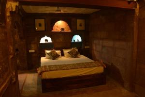 Postel nebo postele na pokoji v ubytování The Arch Boutique Home stay