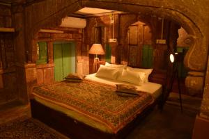 Postel nebo postele na pokoji v ubytování The Arch Boutique Home stay