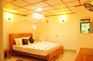 Letto o letti in una camera di Rock Lake Home Stay