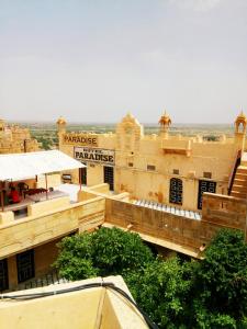 an aerial view of a building in a desert at Hotel Paradise in Jaisalmer