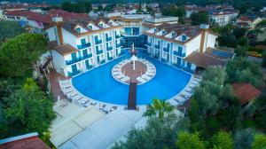 an aerial view of a large building with a swimming pool at Ocean Blue High Class Hotel & SPA in Oludeniz