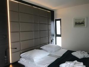 Posteľ alebo postele v izbe v ubytovaní Armada Holiday House