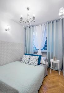 Postel nebo postele na pokoji v ubytování ClickTheFlat Old Town Apart Rooms