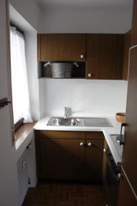 a kitchen with a sink and a counter top at Fewo Königsberger in Garmisch-Partenkirchen