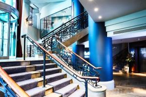 a staircase leading up to a stair case at Malmaison Hotel Leeds in Leeds