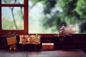 Predel za sedenje v nastanitvi 南庄橄欖樹咖啡民宿 Olive Tree Village Guesthouse