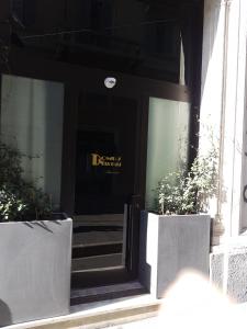 The facade or entrance of Domus Navigli