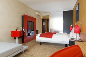 Krevet ili kreveti u jedinici u okviru objekta Post Hotel Weggis