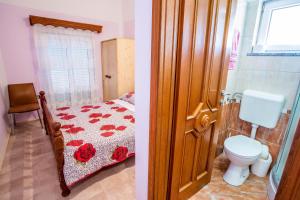 Kúpeľňa v ubytovaní Villa Veli Vrh