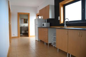 Η κουζίνα ή μικρή κουζίνα στο Casa das Buganvilias