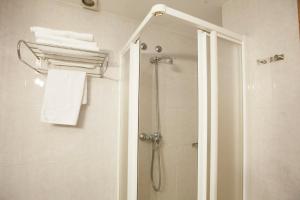 Koupelna v ubytování Hotel PAYRO