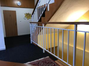 Postel nebo postele na pokoji v ubytování DNM Inn
