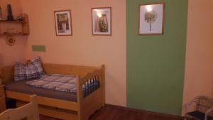 Postel nebo postele na pokoji v ubytování Apartmány Liška