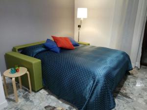 Voodi või voodid majutusasutuse La Bella Vita Apartments toas