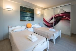 Posteľ alebo postele v izbe v ubytovaní Girasole Villa