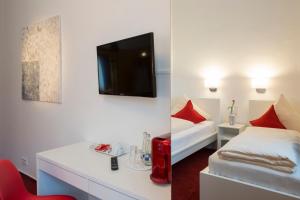 Een bed of bedden in een kamer bij Hotel Mille Stelle City