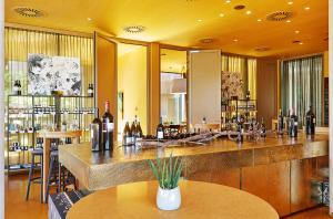 Reštaurácia alebo iné gastronomické zariadenie v ubytovaní LOISIUM Wine & Spa Hotel Südsteiermark