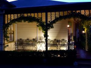 a front porch of a house with an arbor at Goldenray in Castlemaine